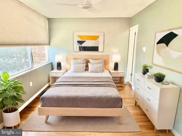 a white toilet sitting next to a bathroom