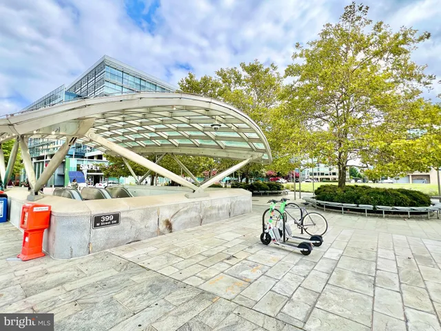 a city street lined with buildings and cars