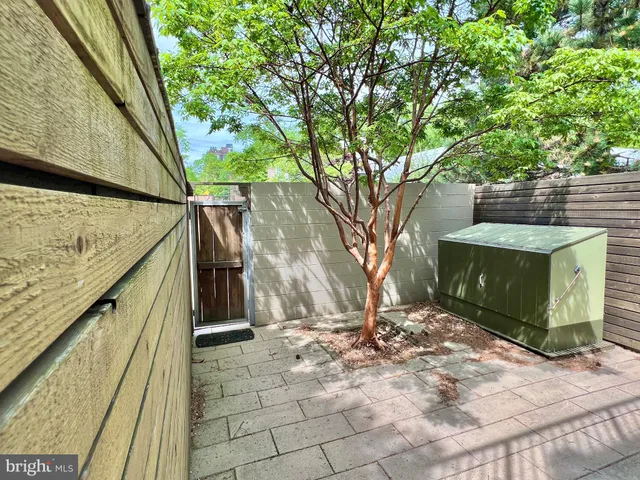 a view of a backyard of the house