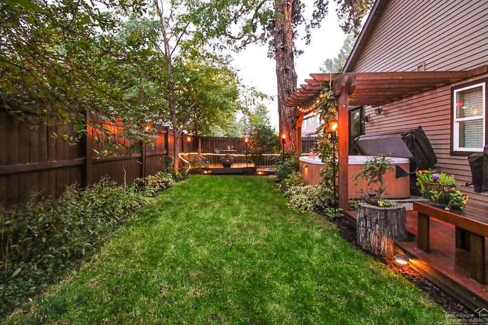 61476 Brosterhous Road Bend, OR 97702 - Photo 25 of 27 Back yard picture when in bloom from previous listing (no hot tub at this time)