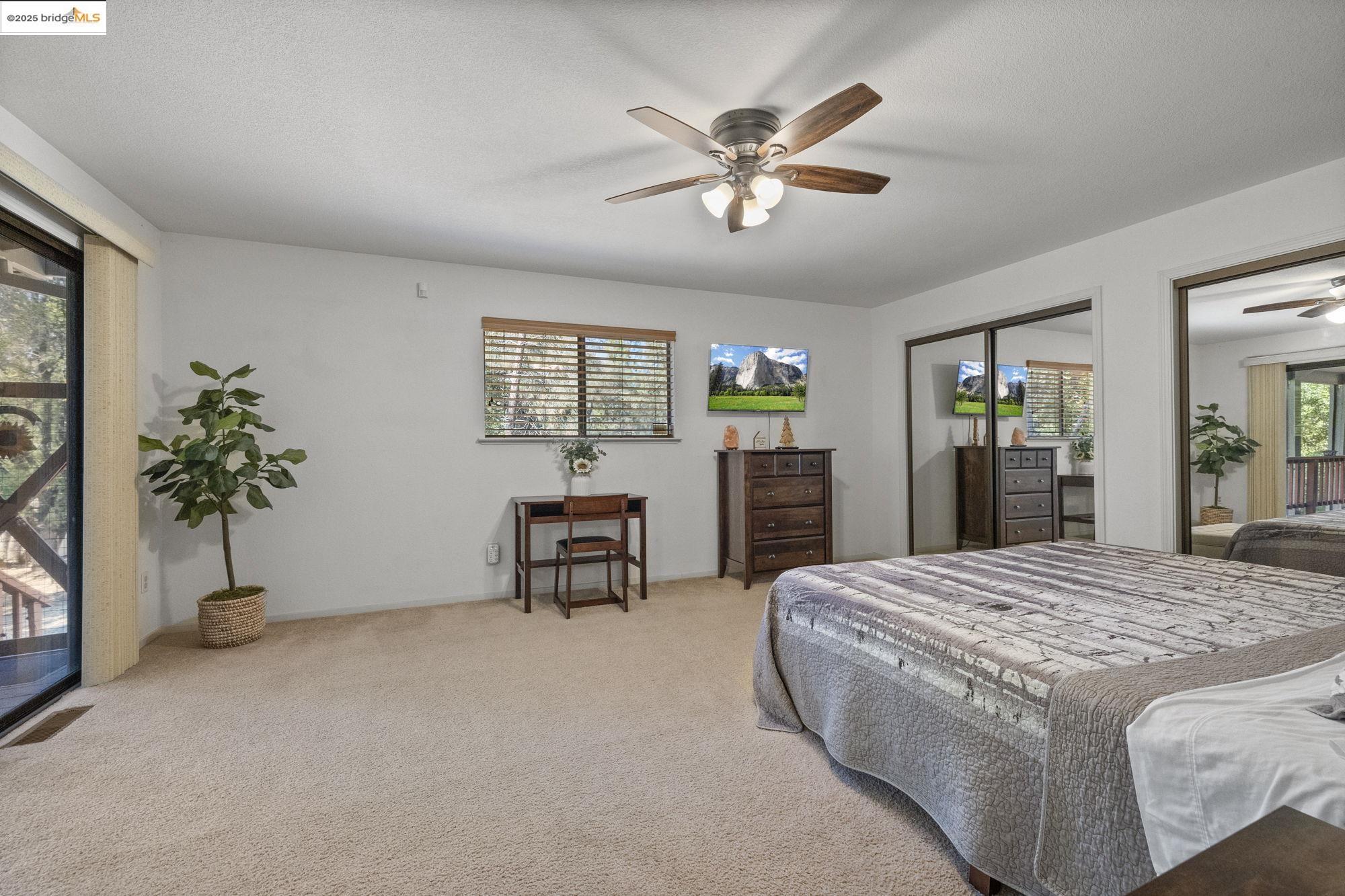 20747 Rising Hill Circle Groveland, CA 95321 - Photo 13 of 60 a living room with furniture and potted plants