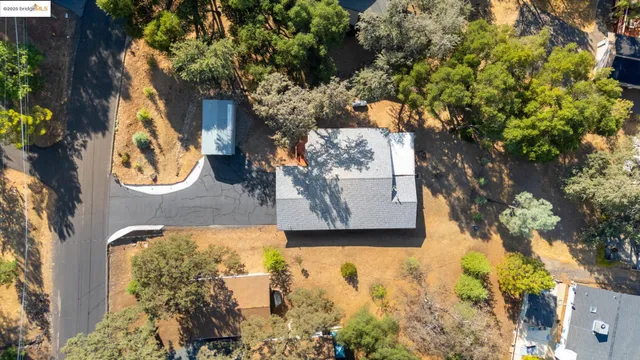 an aerial view of residential house with outdoor space