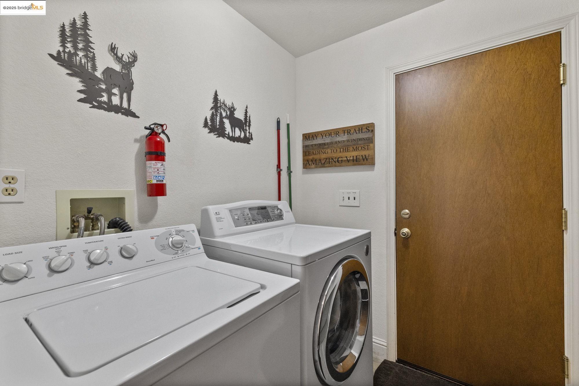 20747 Rising Hill Circle Groveland, CA 95321 - Photo 49 of 60 a utility room with dryer and washer