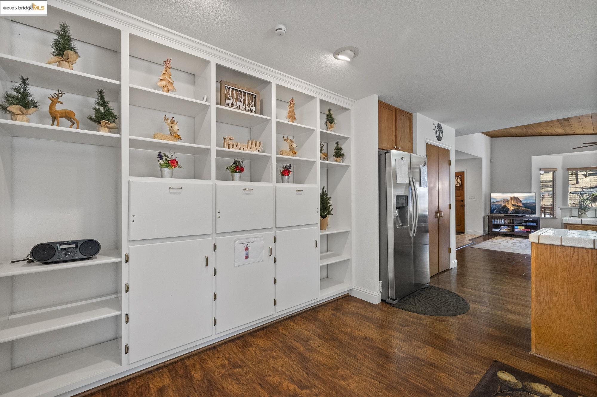 20747 Rising Hill Circle Groveland, CA 95321 - Photo 8 of 60 a view of kitchen with furniture and wooden floor