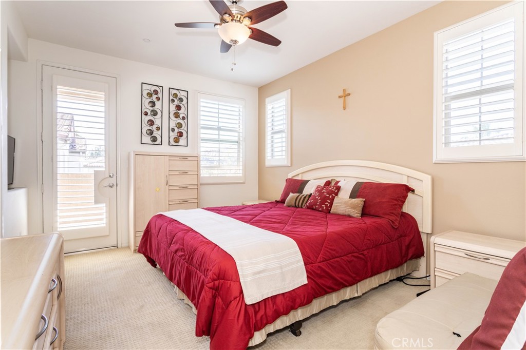 11220 Paseo Sonesta Porter Ranch, CA 91326 - Photo 13 of 46 a bedroom with a bed and window