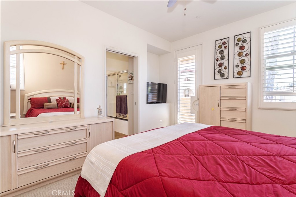 11220 Paseo Sonesta Porter Ranch, CA 91326 - Photo 15 of 46 a bedroom with a bed and a dresser