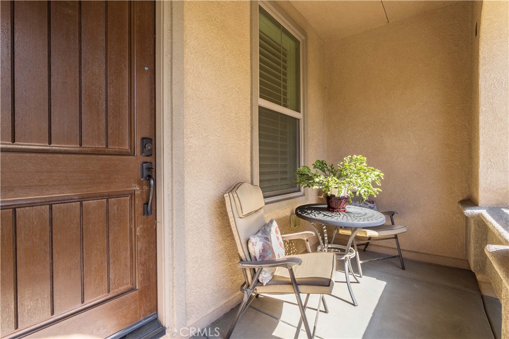 11220 Paseo Sonesta Porter Ranch, CA 91326 - Photo 2 of 46 a dining room with furniture and wooden floor
