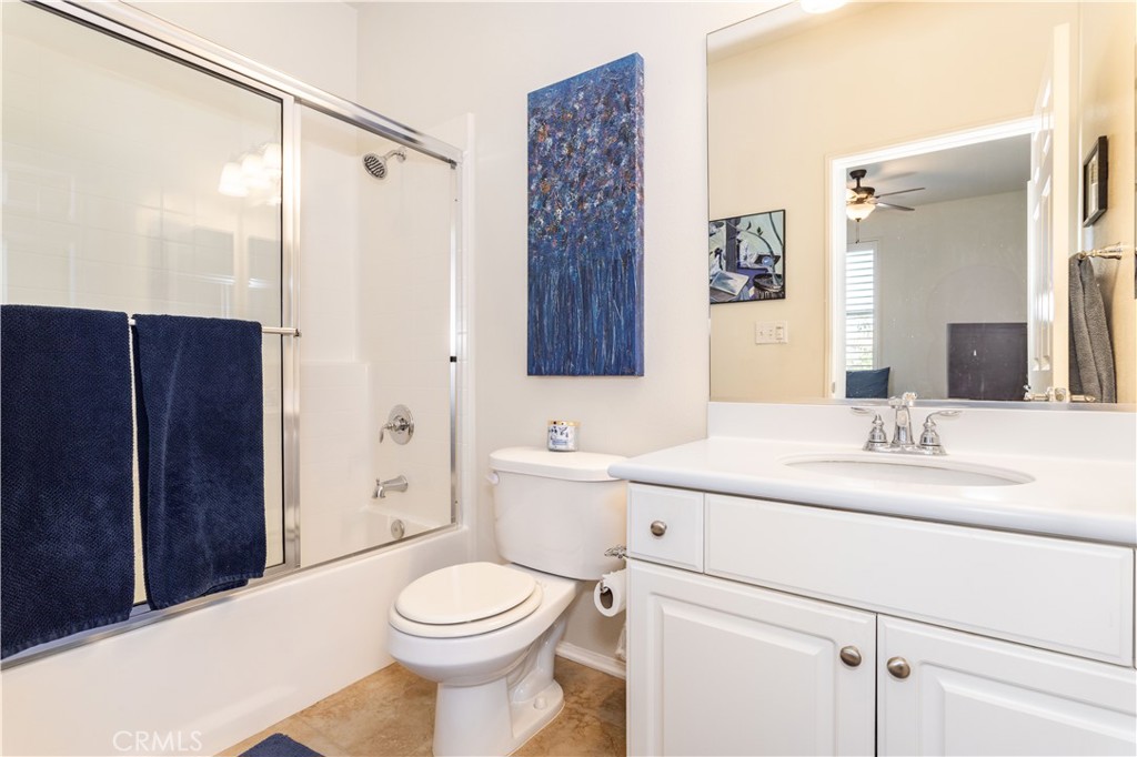 11220 Paseo Sonesta Porter Ranch, CA 91326 - Photo 22 of 46 a bathroom with a sink a toilet and shower
