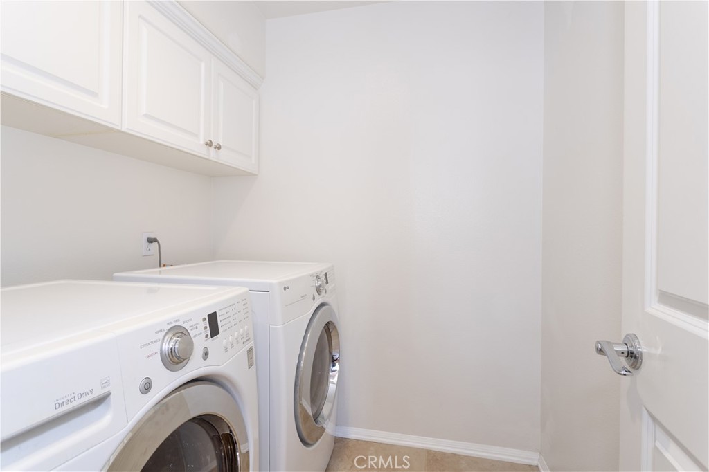 11220 Paseo Sonesta Porter Ranch, CA 91326 - Photo 26 of 46 a utility room with dryer and washer
