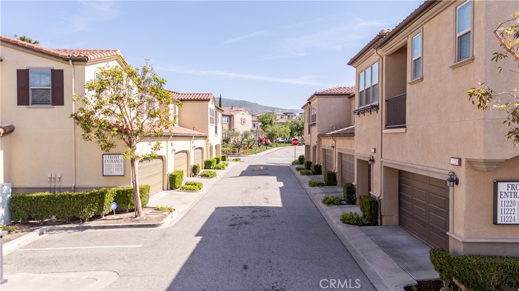 11220 Paseo Sonesta Porter Ranch, CA 91326 - Photo 40 of 46 a view of a street with buildings