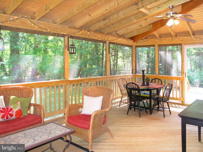 2419 Silver Fox Lane Reston, VA 20191 - Photo 2 of 30 a view of a dining room with furniture window and outside view