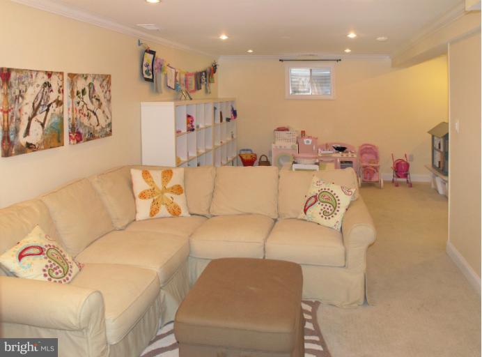 2419 Silver Fox Lane Reston, VA 20191 - Photo 27 of 30 a living room with furniture and a couch