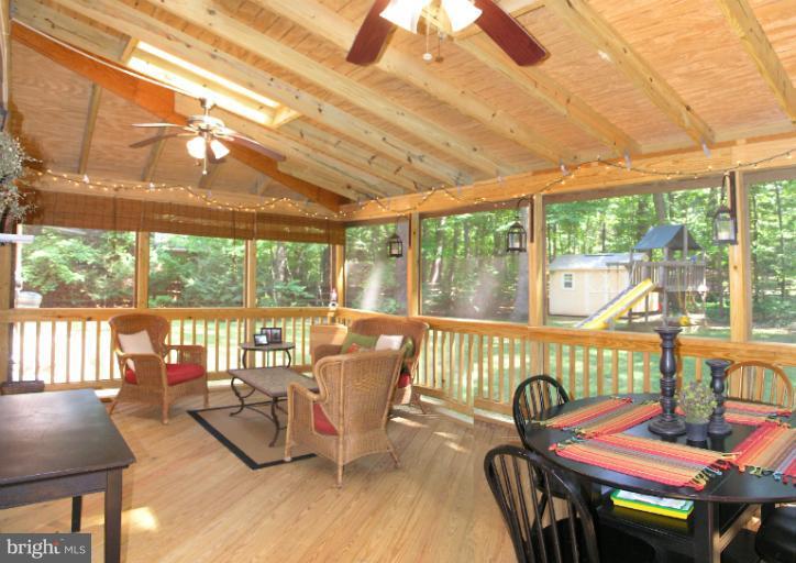2419 Silver Fox Lane Reston, VA 20191 - Photo 8 of 30 a view of a dining room with furniture window and outside view