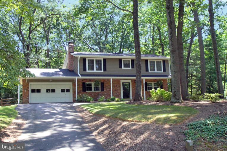 2419 Silver Fox Lane Reston, VA 20191 - Photo 9 of 30 a front view of a house with garden