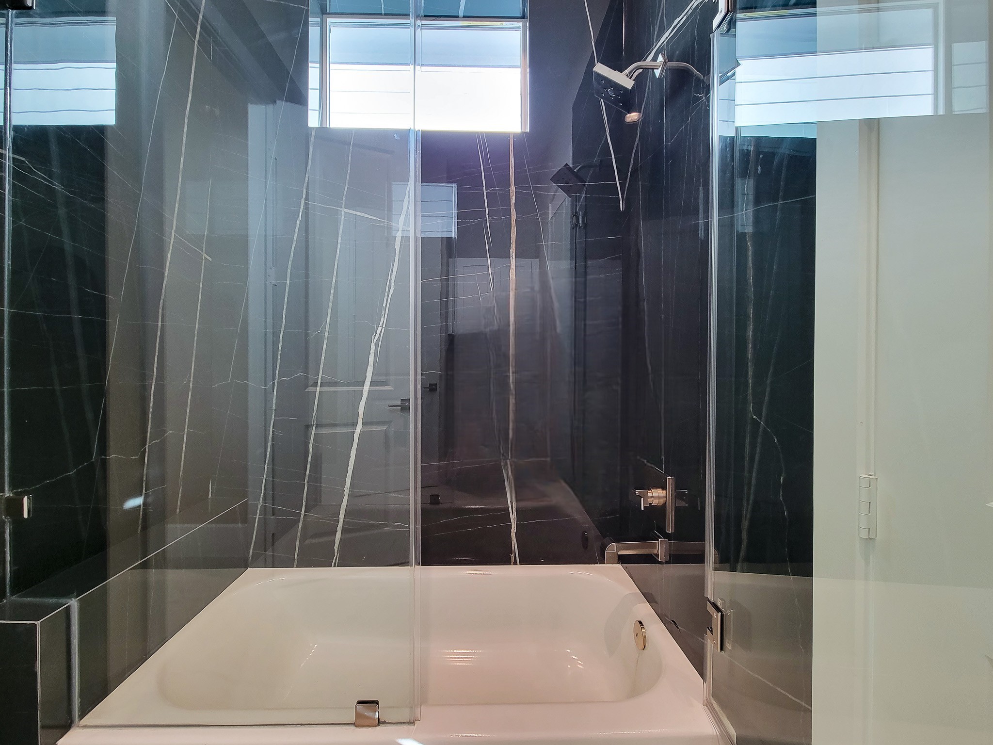 5613 Leonard Street Houston, TX 77023 - Photo 24 of 44 a bathroom with a bathtub