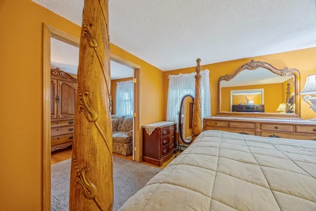 a en suite bathroom with a tub and mirror