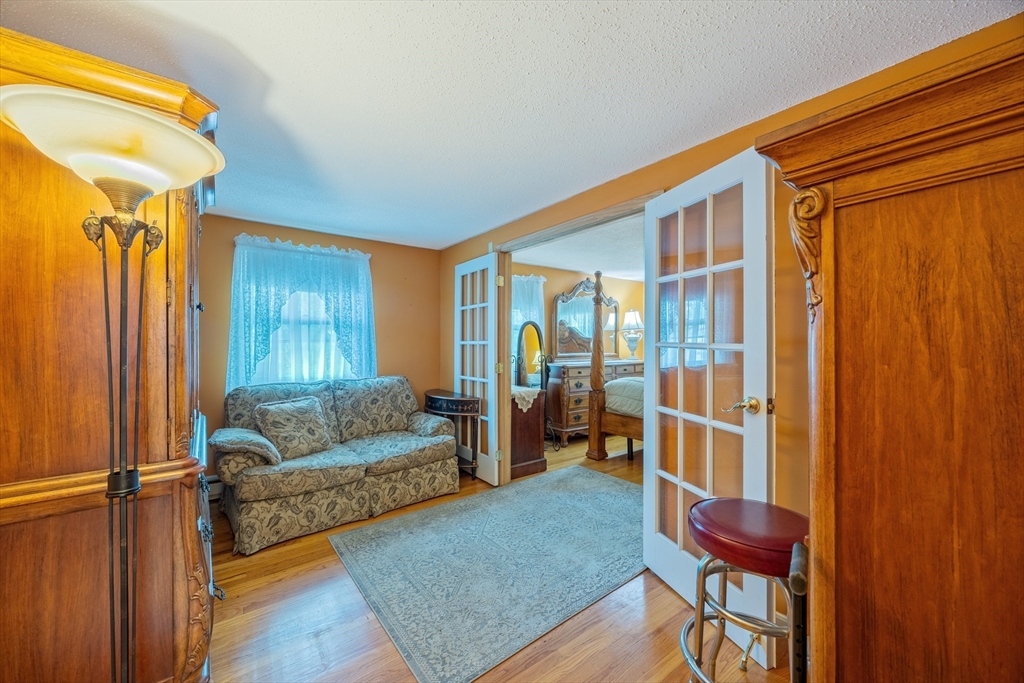 60 Elizabeth Street Feeding Hills, MA 01030 - Photo 15 of 39 a bedroom with furniture and a window