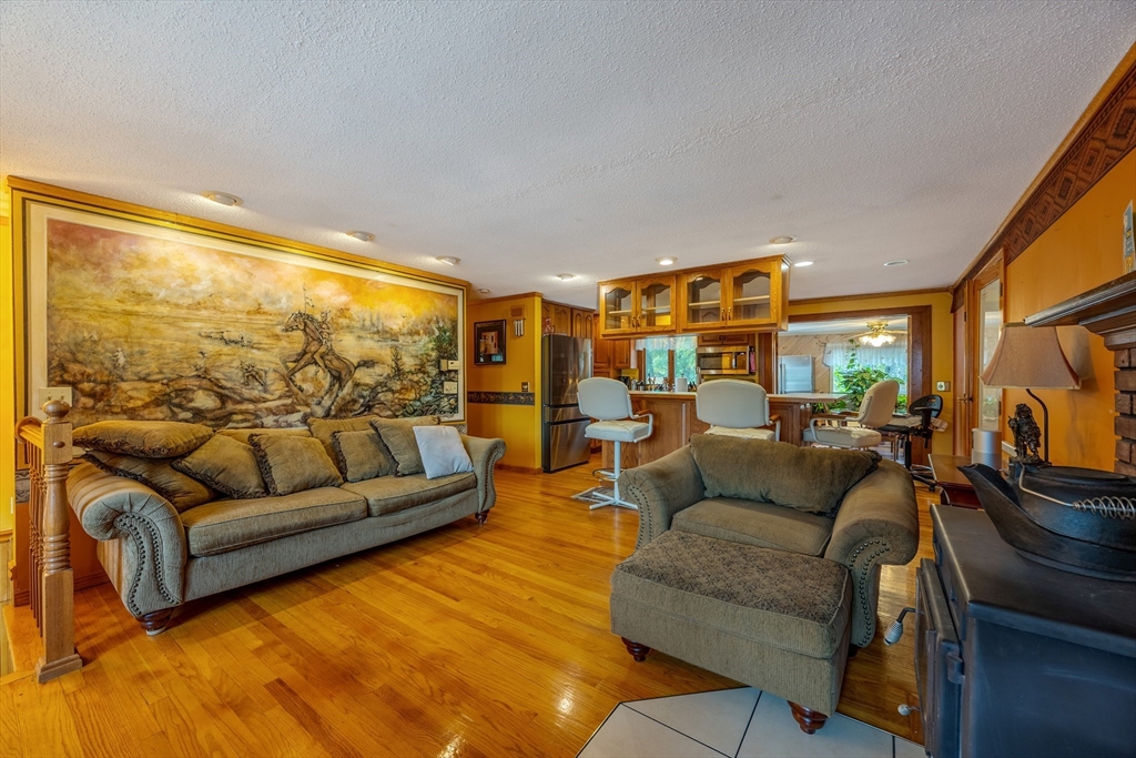 60 Elizabeth Street Feeding Hills, MA 01030 - Photo 2 of 39 a living room with furniture and a large window