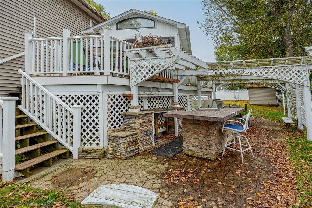 60 Elizabeth Street Feeding Hills, MA 01030 - Photo 26 of 39 a view of a chairs with a deck