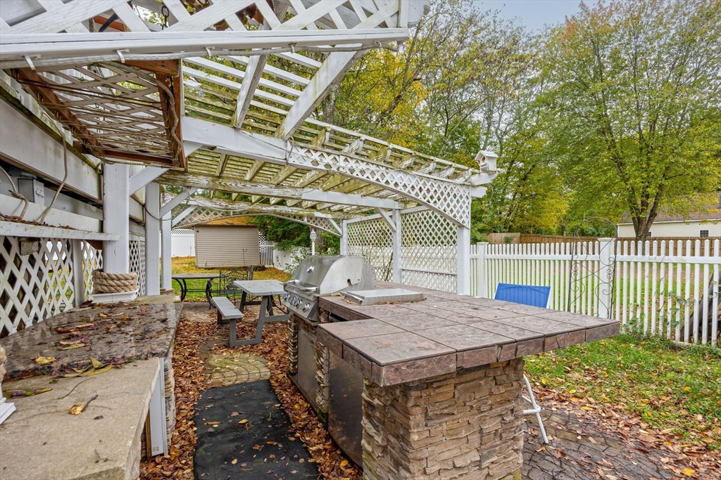 60 Elizabeth Street Feeding Hills, MA 01030 - Photo 27 of 39 a view of a dinning table and chairs in patio
