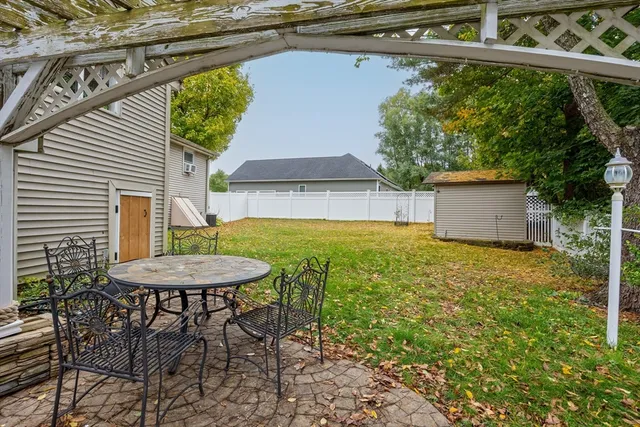 a view of a backyard with a garden and plants