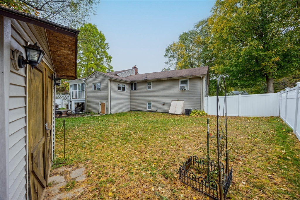 60 Elizabeth Street Feeding Hills, MA 01030 - Photo 31 of 39 a view of a house with a backyard