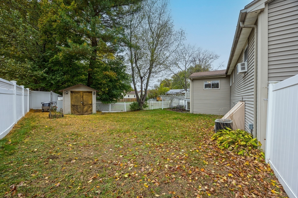 60 Elizabeth Street Feeding Hills, MA 01030 - Photo 32 of 39 a house view with a backyard space