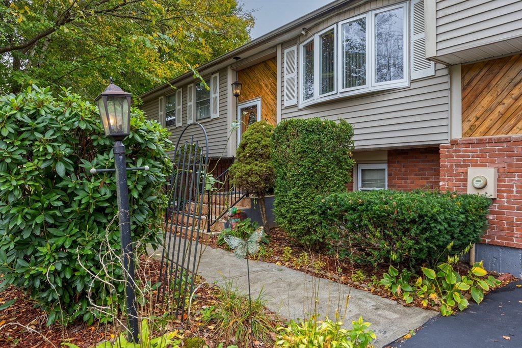 60 Elizabeth Street Feeding Hills, MA 01030 - Photo 35 of 39 front view of a house with a yard