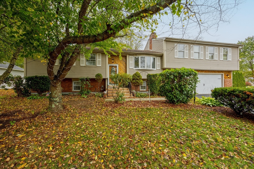 60 Elizabeth Street Feeding Hills, MA 01030 - Photo 36 of 39 front view of a house with a yard