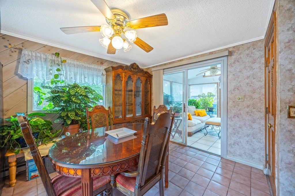 60 Elizabeth Street Feeding Hills, MA 01030 - Photo 10 of 39 a outdoor dining space with furniture and a potted plant