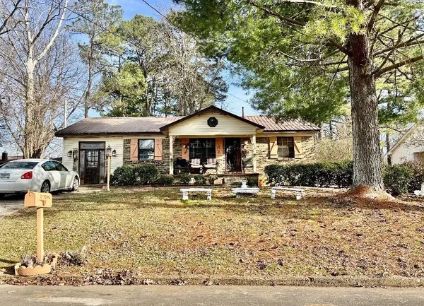 a front view of a house with swimming pool