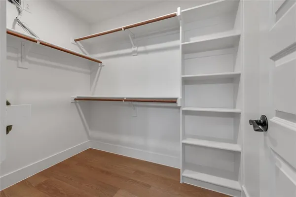 a view of an empty walk in closet