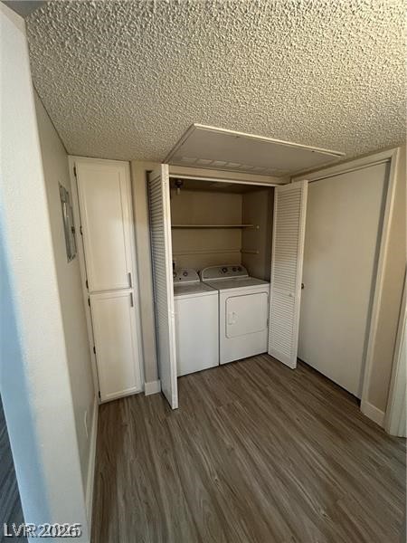 9070 Spring Mountain Road, Unit 210 Las Vegas, NV 89117 - Photo 10 of 12 This dedicated laundry area offers practical convenience with essential appliances and durable flooring.