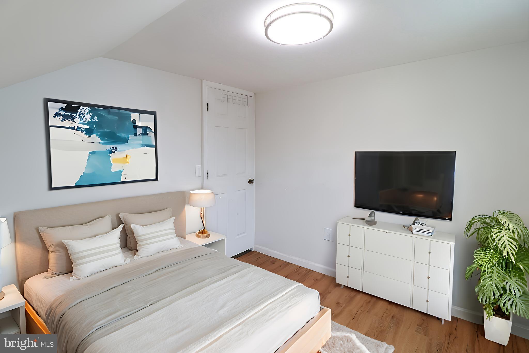 495 York Haven Road York Haven, PA 17370 - Photo 26 of 58 a bedroom with a bed and a flat screen tv