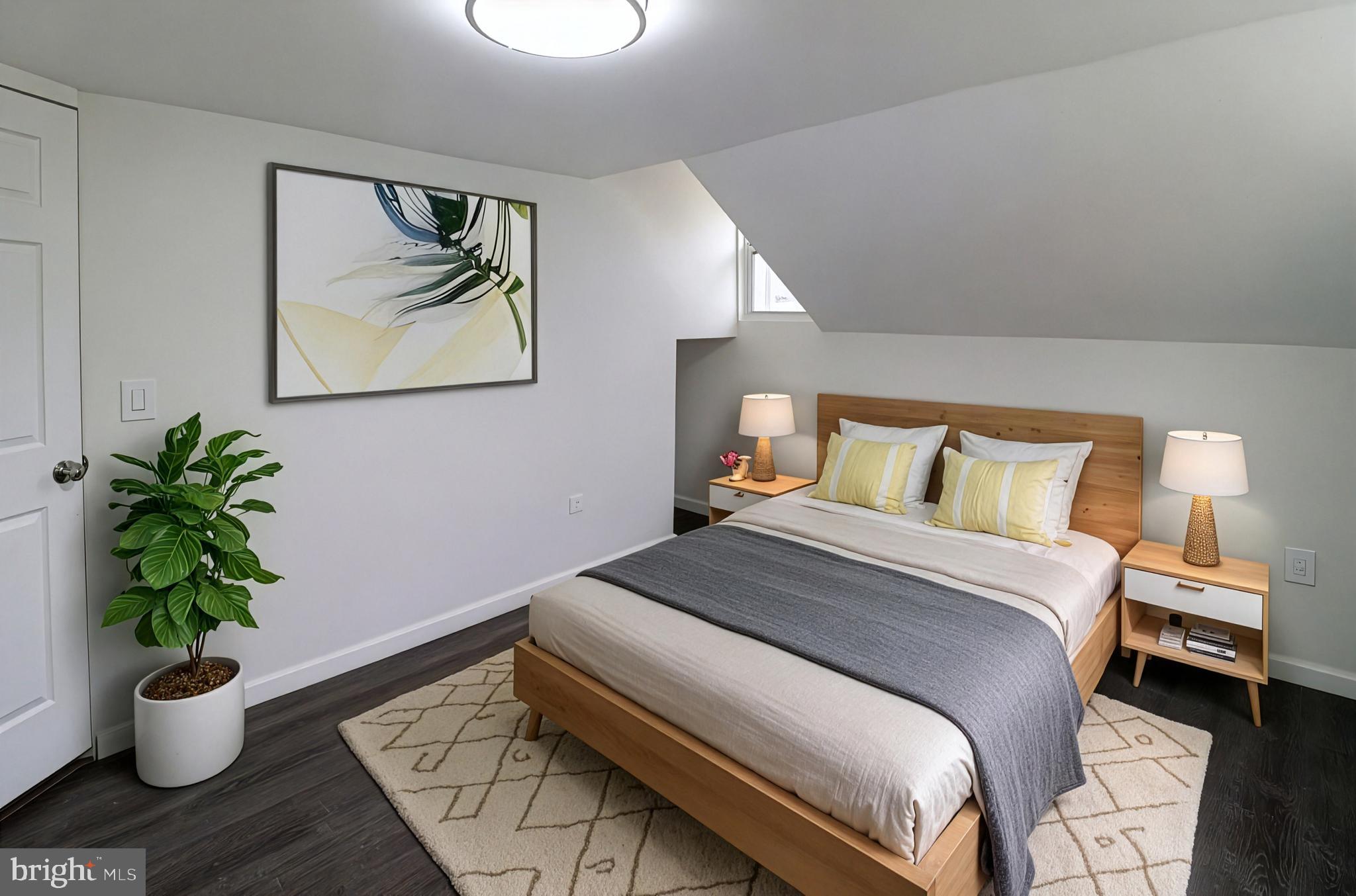 495 York Haven Road York Haven, PA 17370 - Photo 31 of 58 a bedroom with a bed and wooden floor