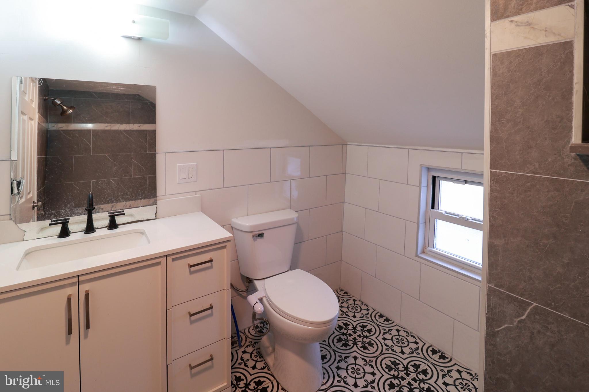 495 York Haven Road York Haven, PA 17370 - Photo 32 of 58 a bathroom with a sink a toilet and a mirror
