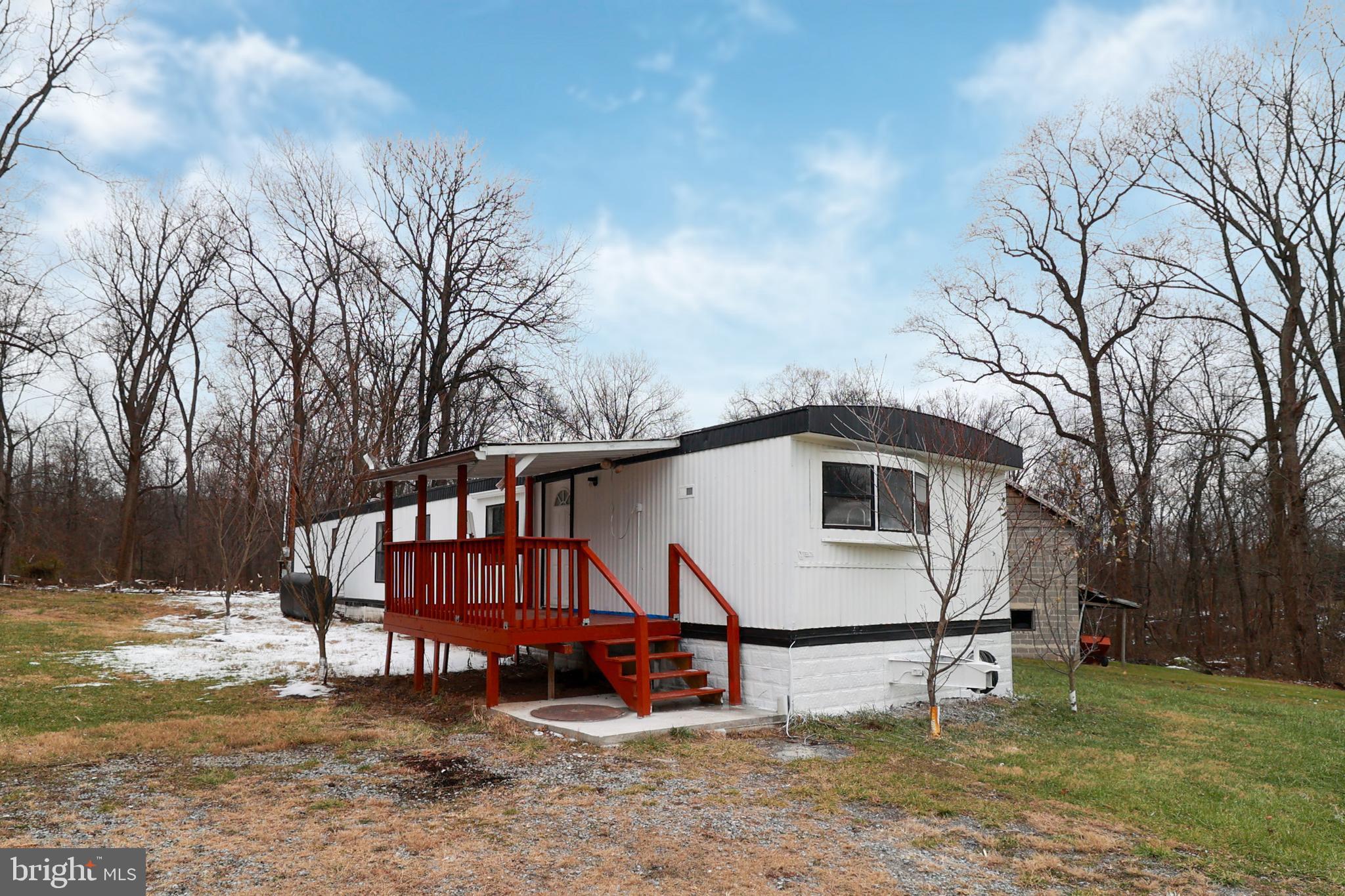 495 York Haven Road York Haven, PA 17370 - Photo 39 of 58 a backyard of a house with wooden floor and outdoor seating