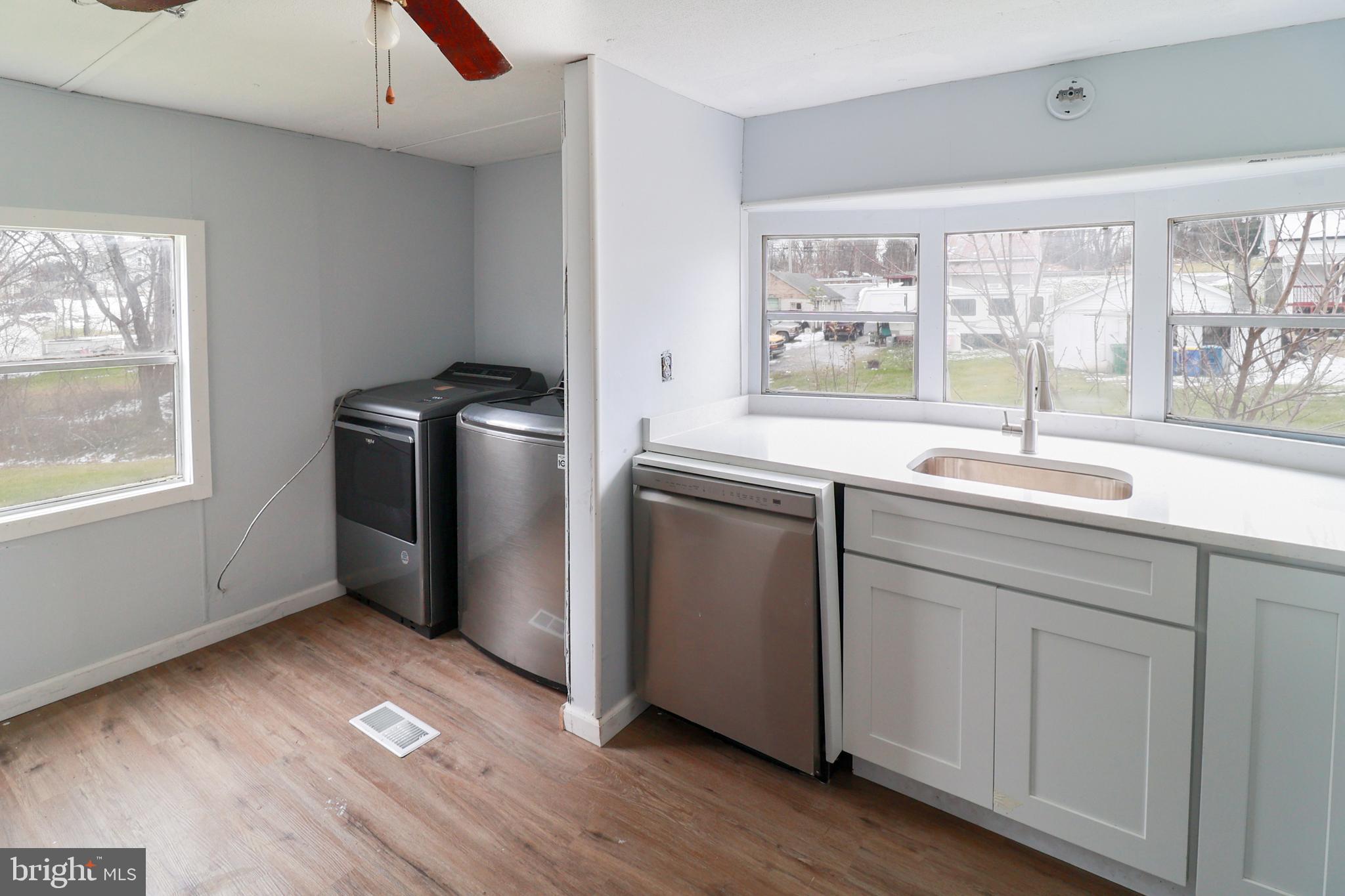 495 York Haven Road York Haven, PA 17370 - Photo 46 of 58 a kitchen with stainless steel appliances granite countertop a sink a stove and a refrigerator