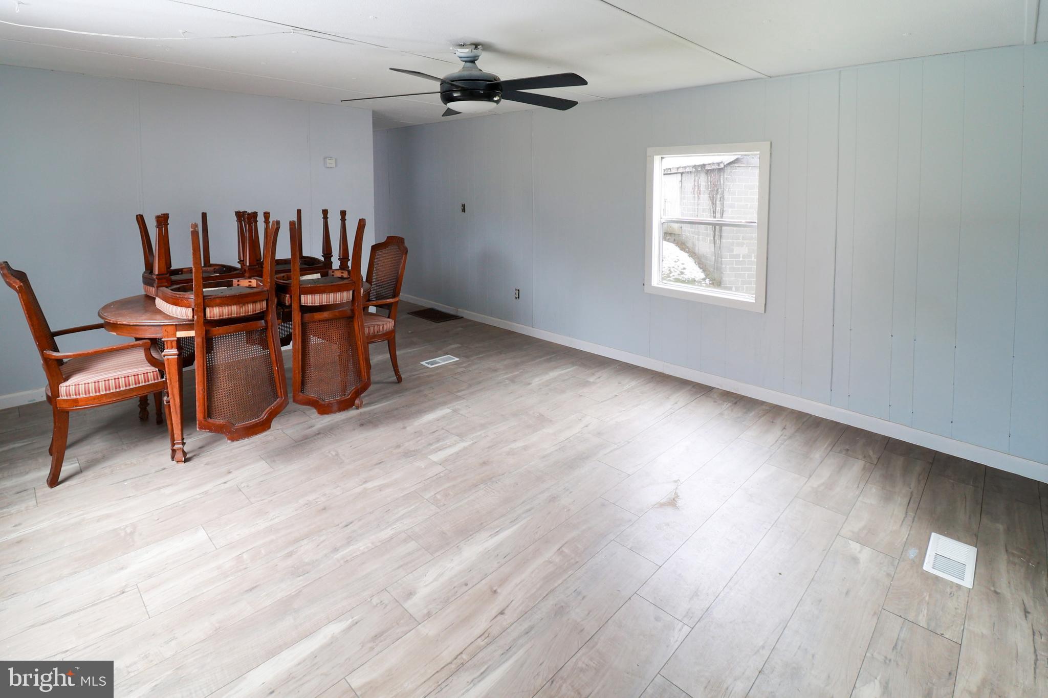 495 York Haven Road York Haven, PA 17370 - Photo 47 of 58 a view of a dining room with furniture window and wooden floor