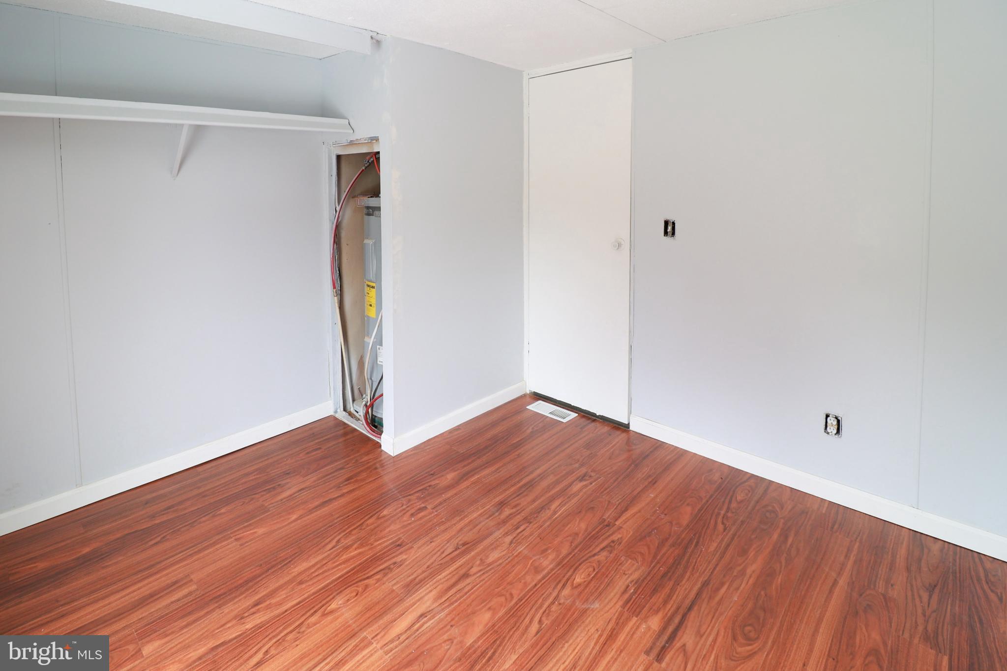 495 York Haven Road York Haven, PA 17370 - Photo 53 of 58 an empty room with wooden floor and closet