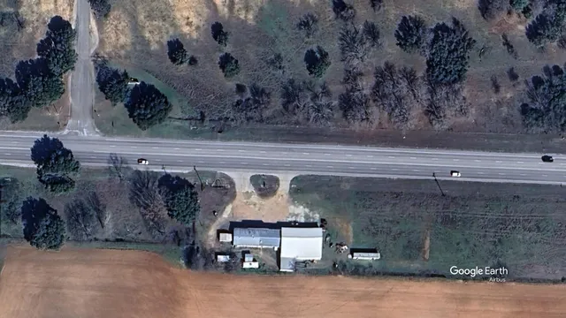 a view of a swimming pool and an outdoor space