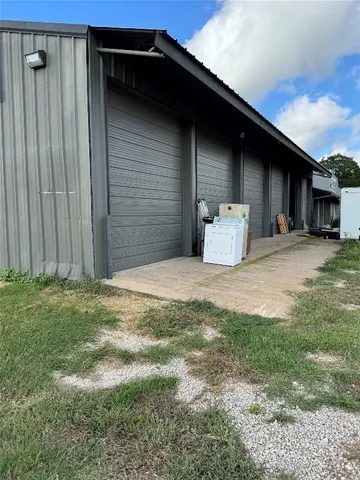 a backyard of a house with yard and seating space