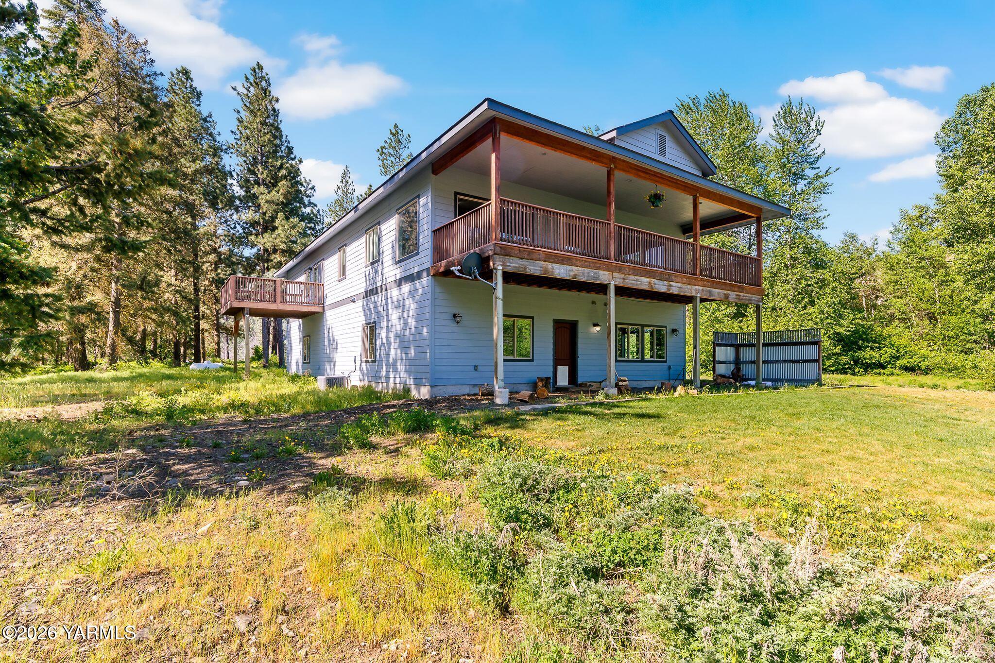 1575 Nile Road Naches, WA 98937 - Photo 35 of 51 a view of a house with a yard
