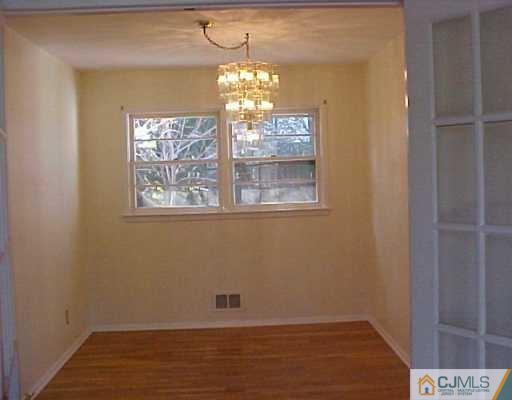 33 Burnham Road East Brunswick, NJ 08816 - Photo 6 of 7 a view of livingroom with window