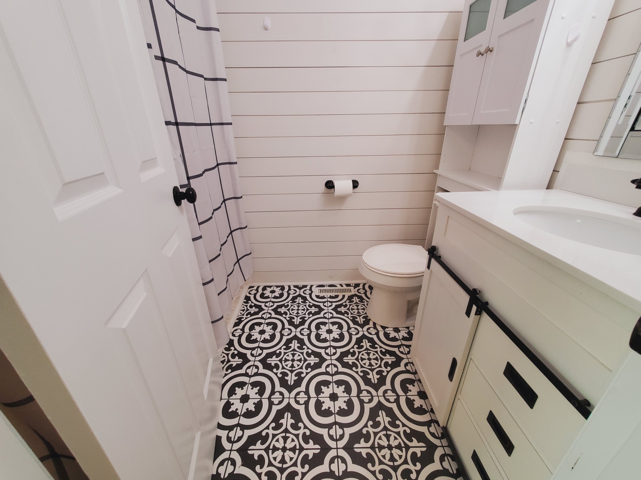 324 West Harper Road Portland, TN 37148 - Photo 11 of 25 a bathroom with a toilet and a shower