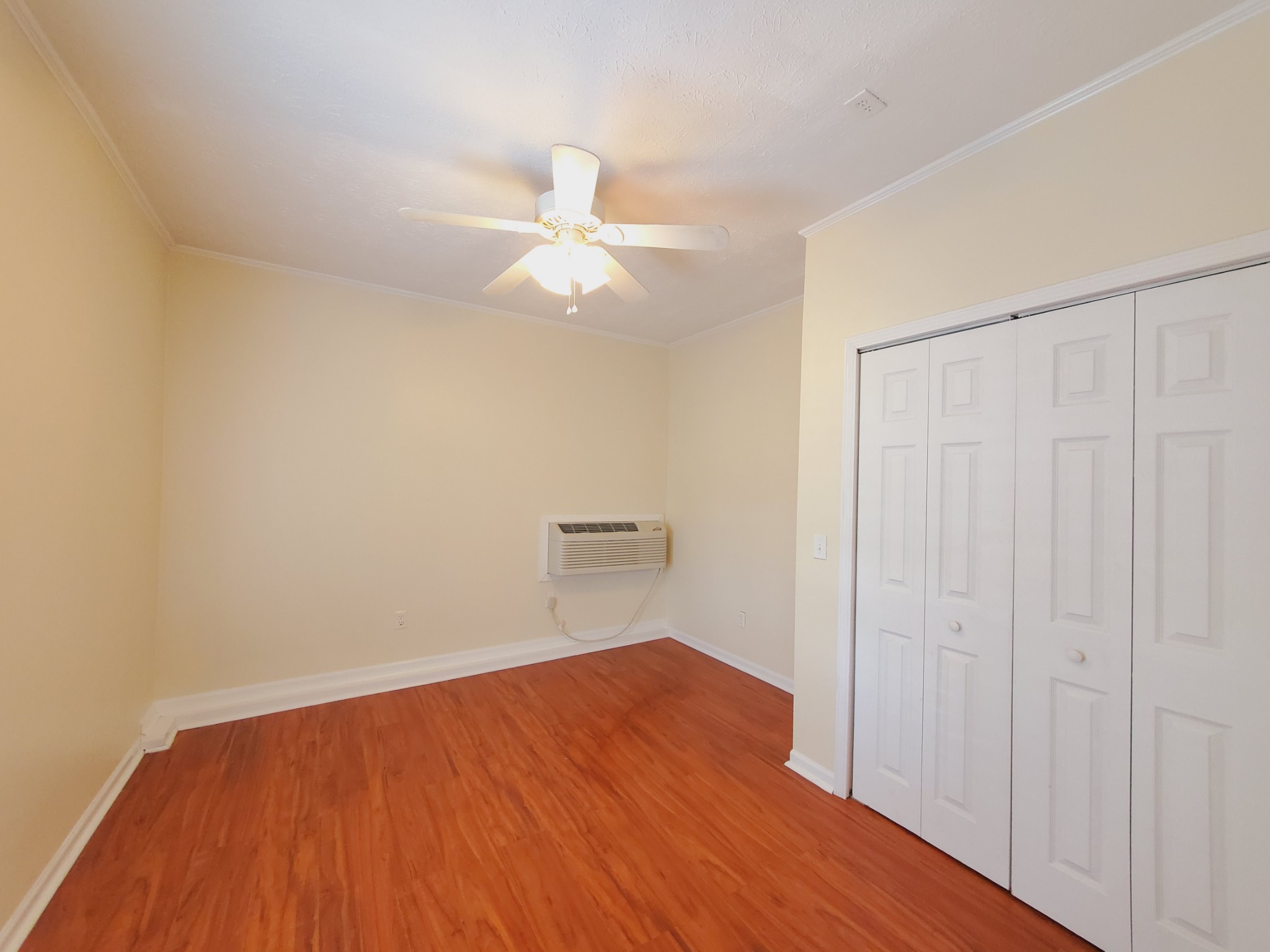 324 West Harper Road Portland, TN 37148 - Photo 15 of 25 wooden floor in an empty room with a window