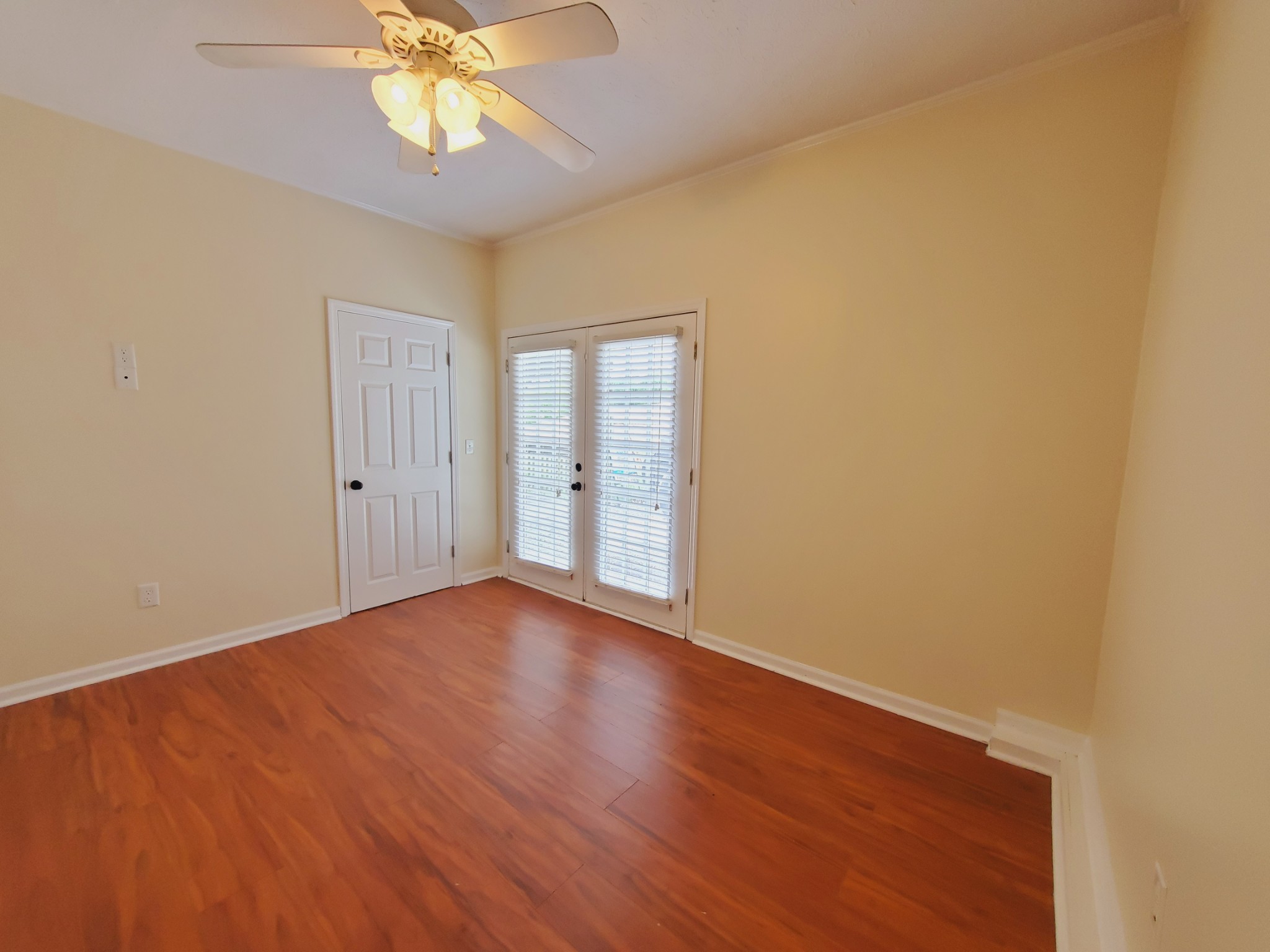 324 West Harper Road Portland, TN 37148 - Photo 16 of 25 wooden floor in an empty room with a window