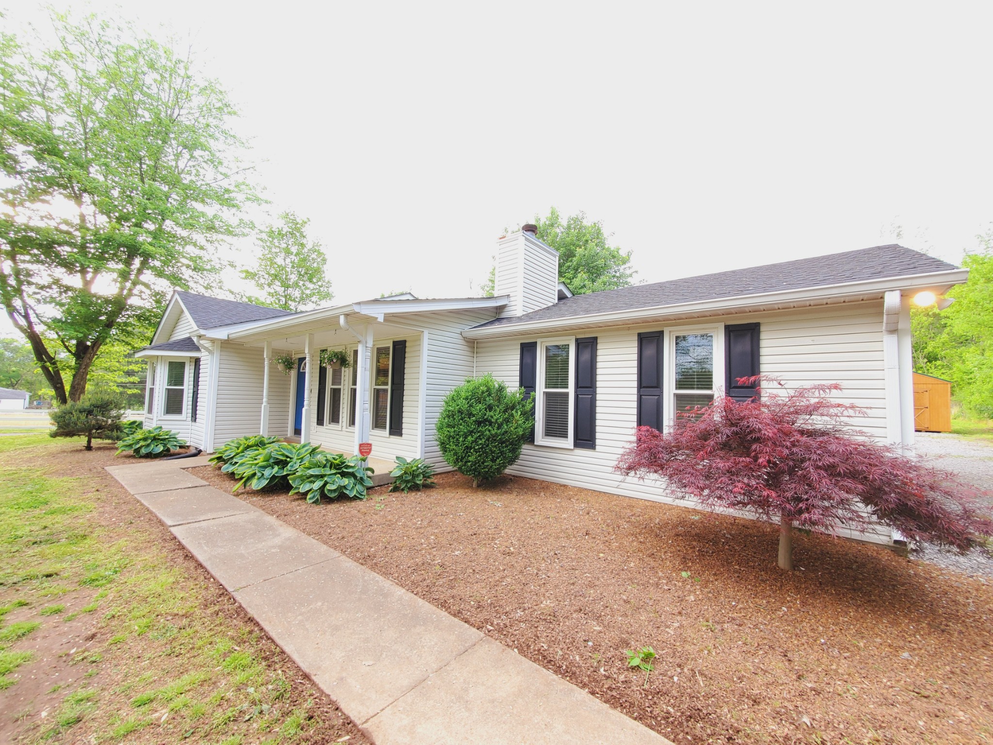 324 West Harper Road Portland, TN 37148 - Photo 23 of 25 front view of a house with a yard