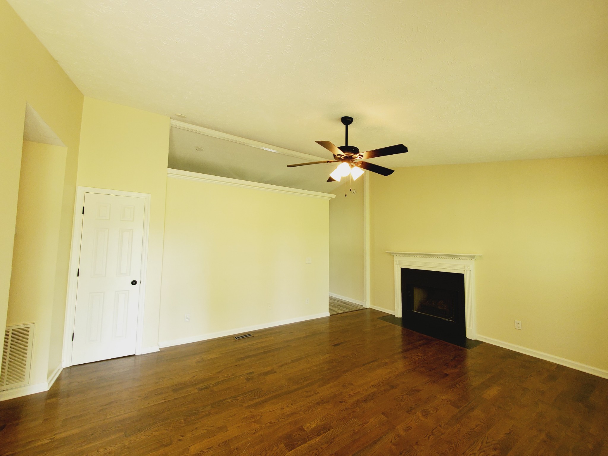 324 West Harper Road Portland, TN 37148 - Photo 3 of 25 a view of empty room with wooden floor and fan