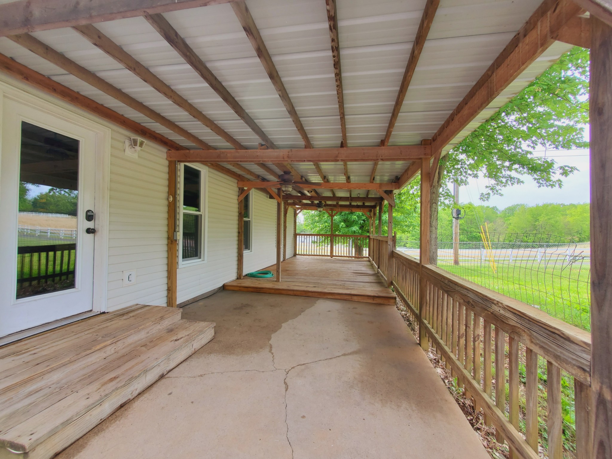 324 West Harper Road Portland, TN 37148 - Photo 8 of 25 a view of a porch with a backyard